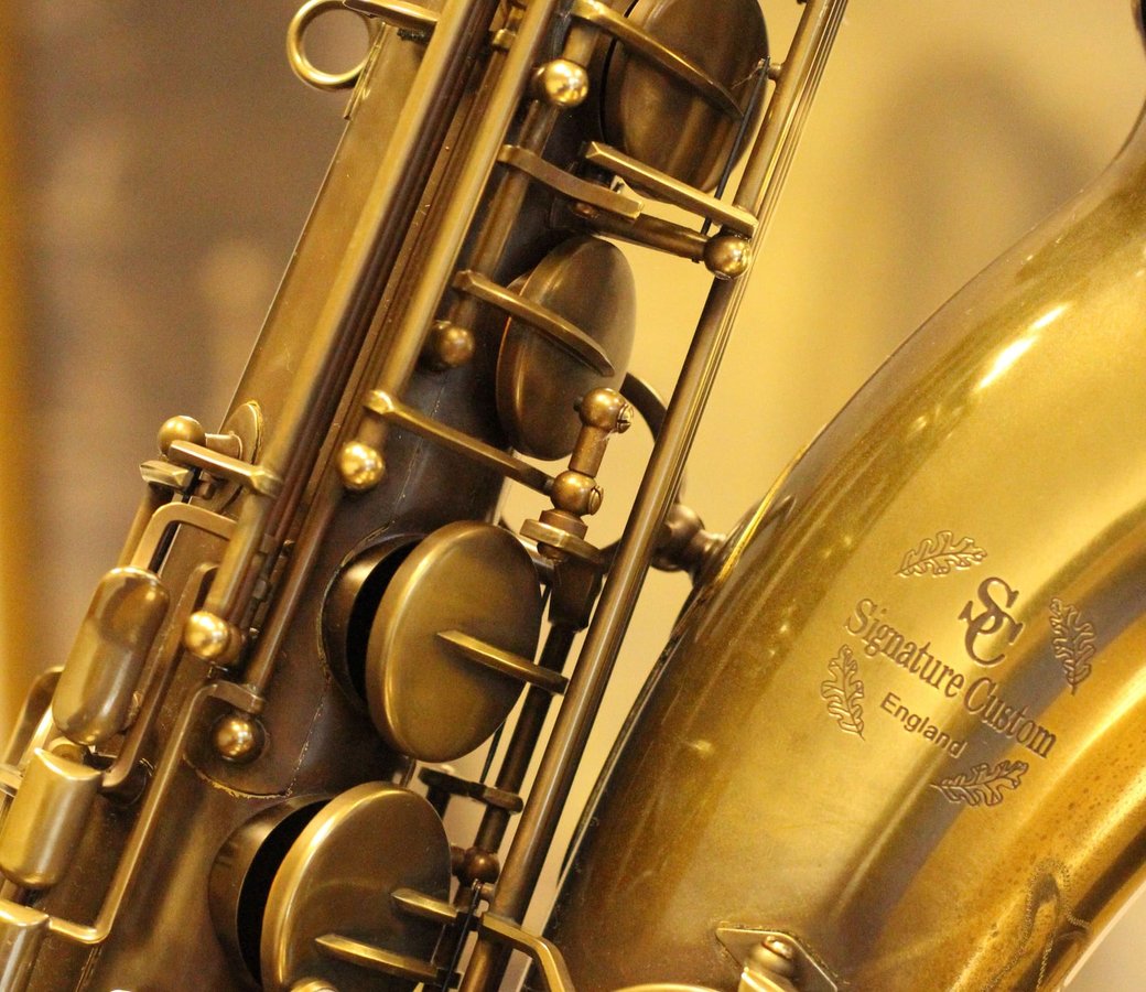 Close-up of the keys and rods on a tenor saxophone